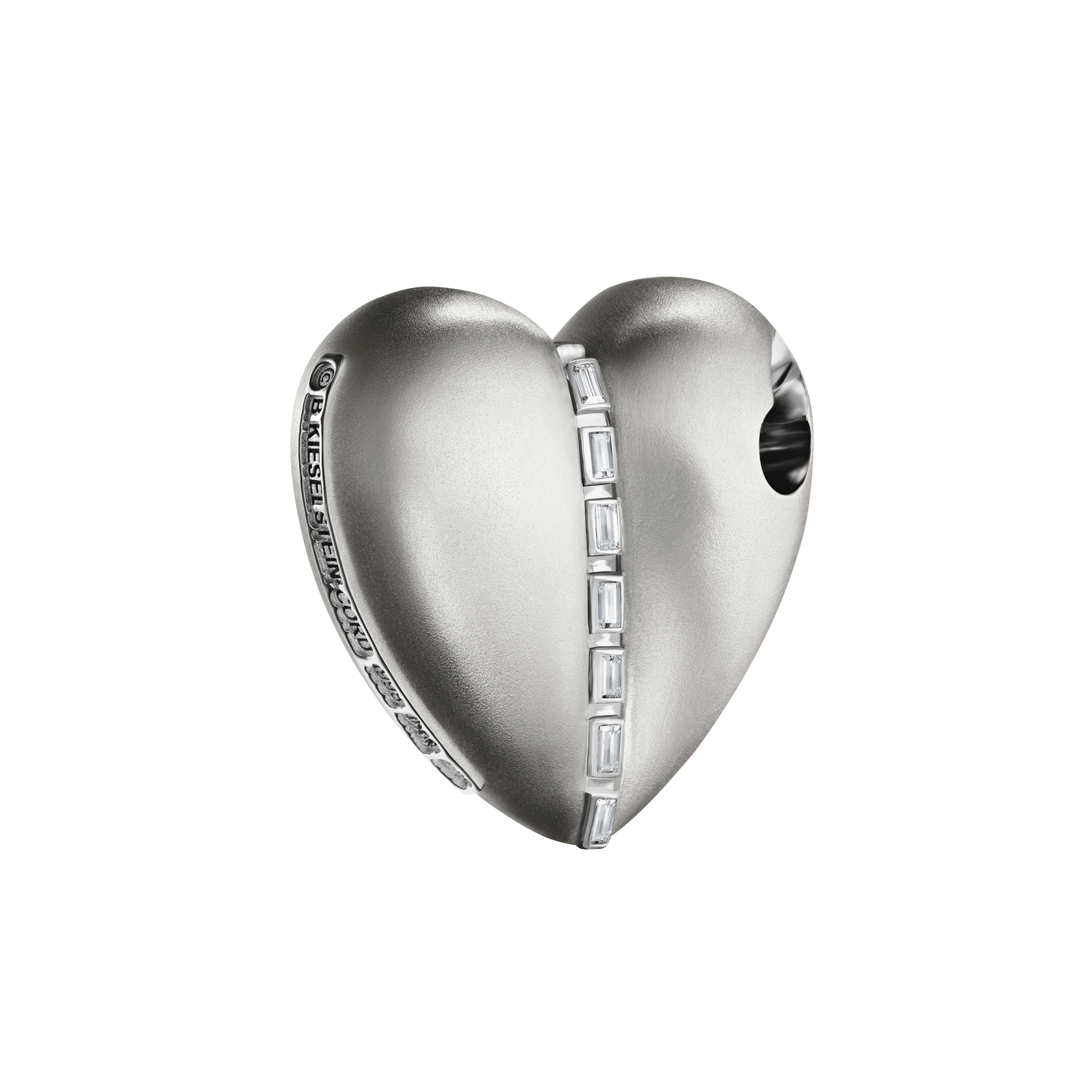A detail of Bullet Hole Heart Pendant with Baguettes M in Silver